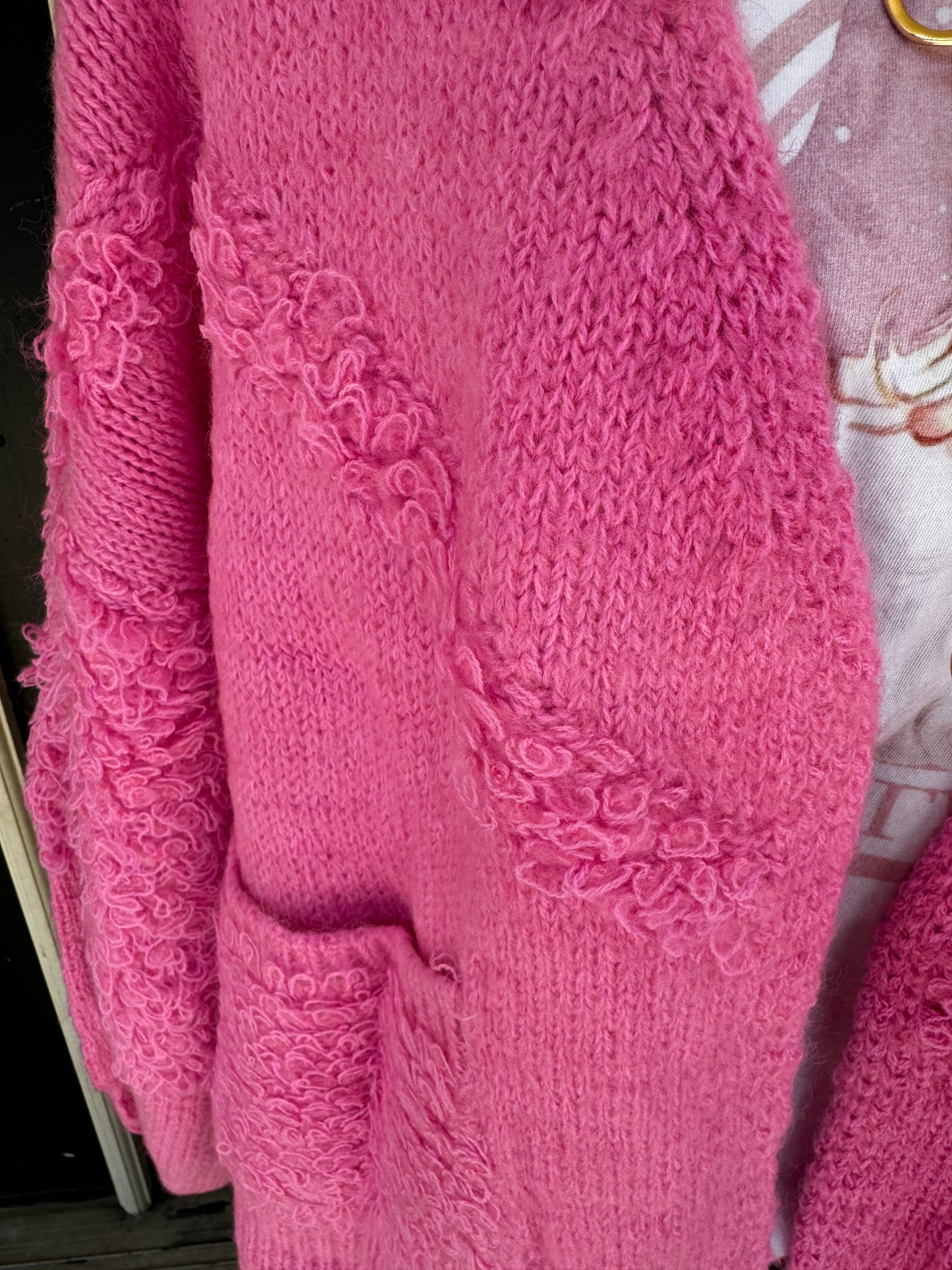 A PINK  CARDIGAN