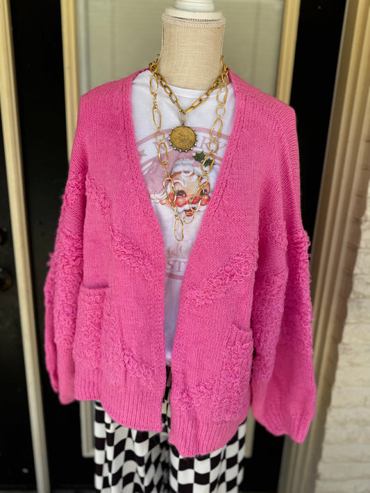 A PINK  CARDIGAN